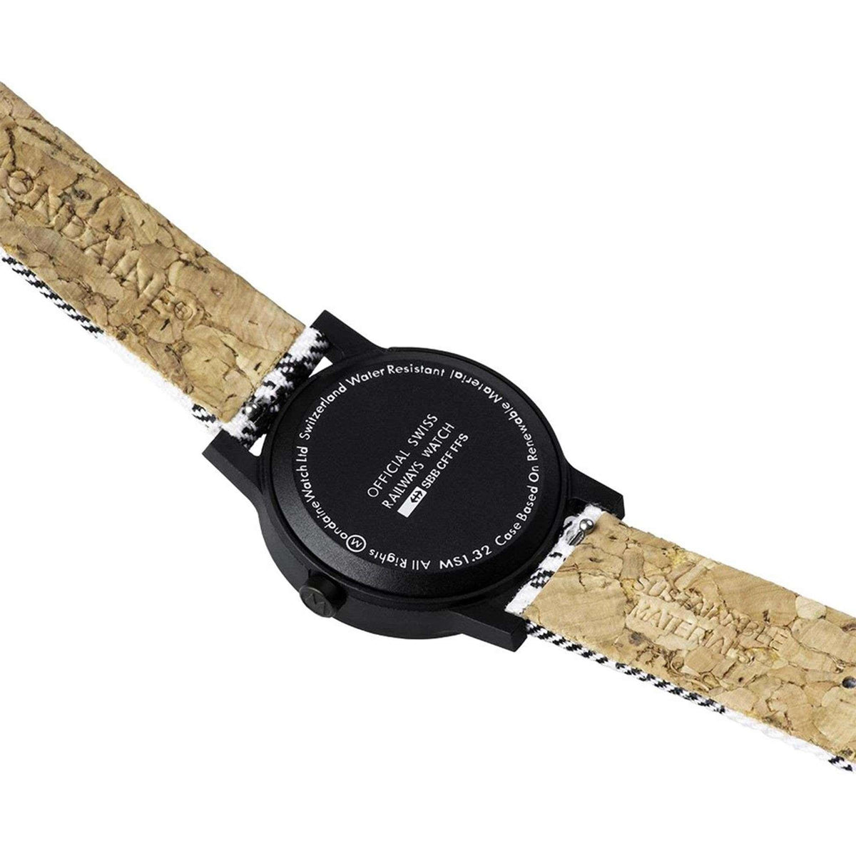 Ladies quartz wristwatch with engraved black caseback and tan-brown strap underside