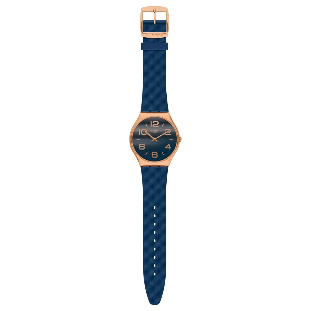 Swatch quartz watch with blue dial, gold markers, dark blue rubber strap, side view