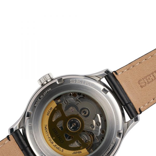 Seiko Presage men's watch back view with skeleton dial and black leather strap