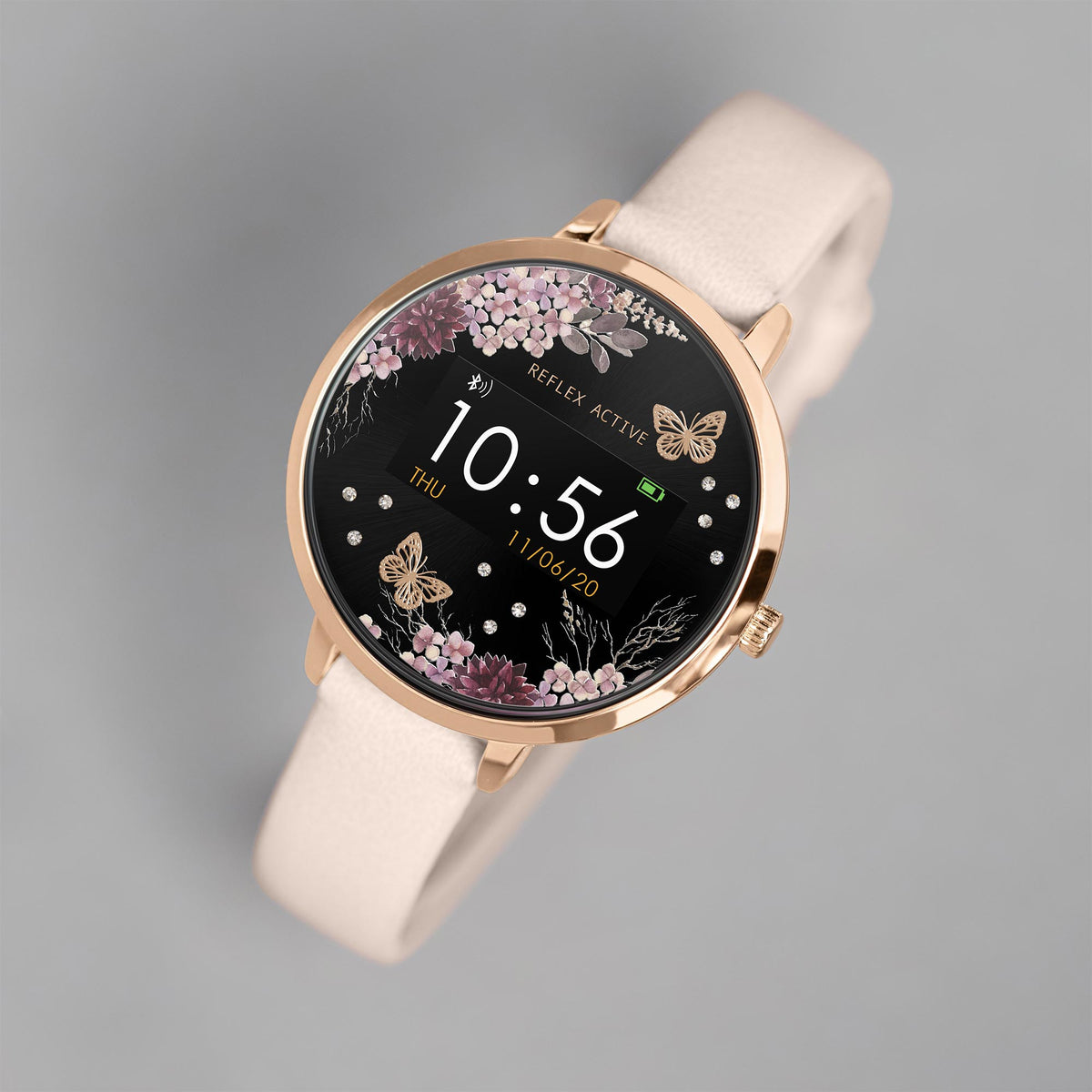 Rose-gold smart watch with black floral dial, beige silicone strap