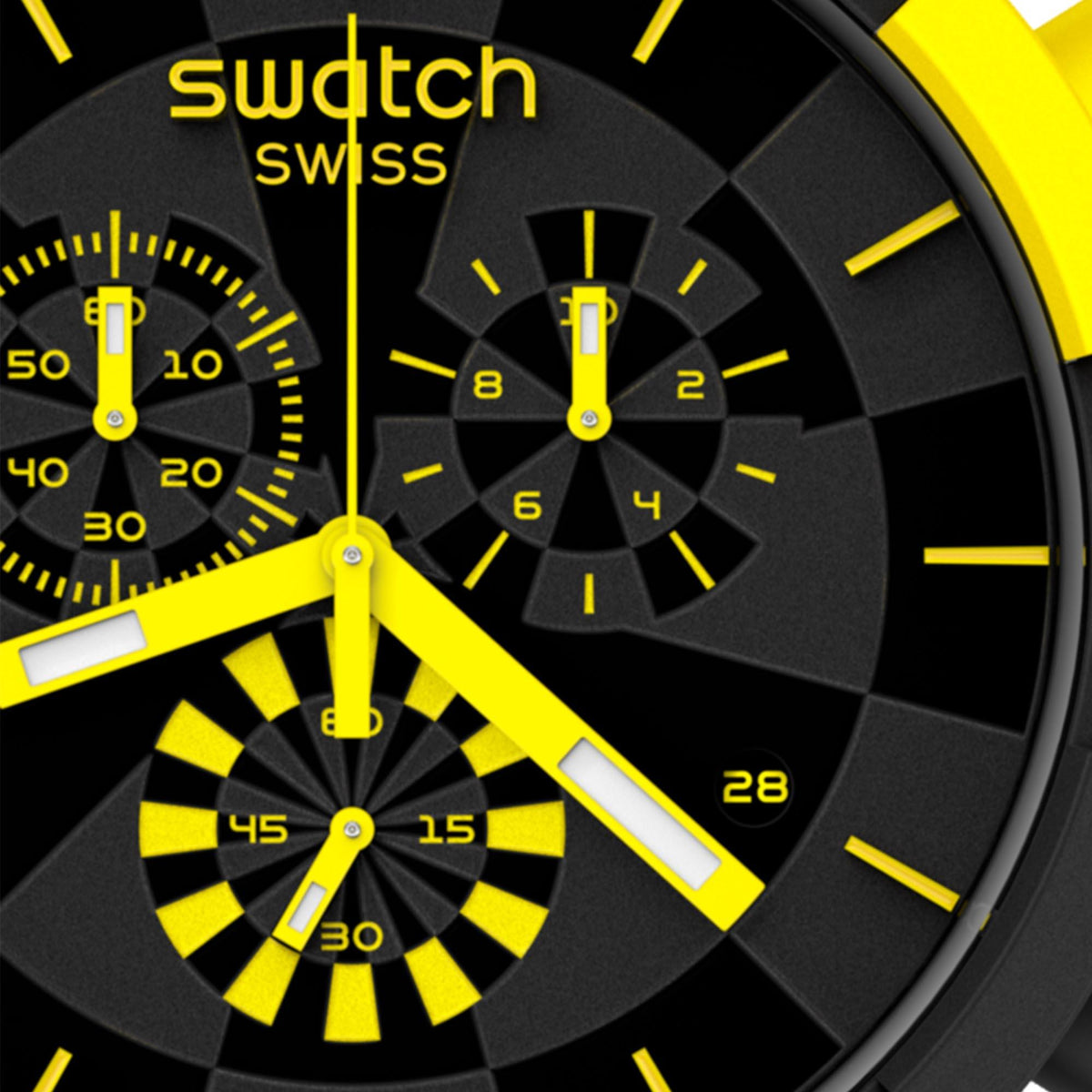 Close-up of black chronograph dial with yellow checkered design and subdials