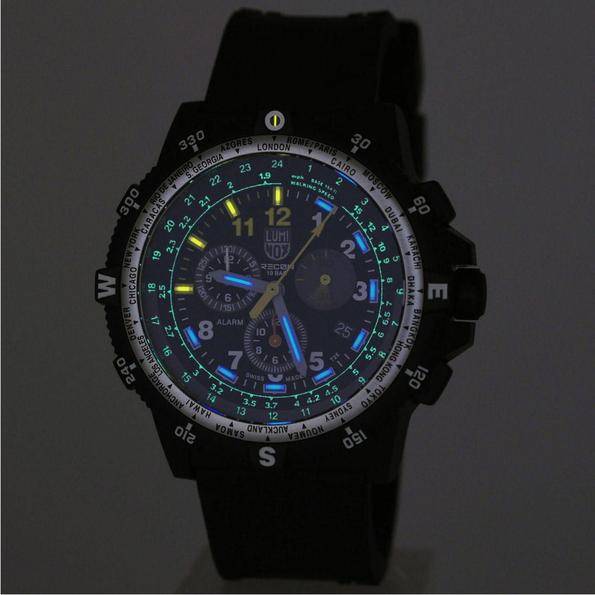 Men's Luminox chronograph watch with blue and green illuminated dial, black silicone strap.