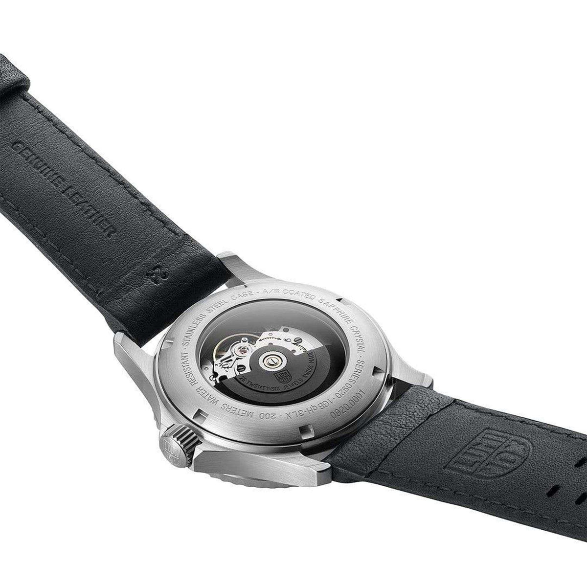 Back of stainless steel watch with black leather strap and caseback details