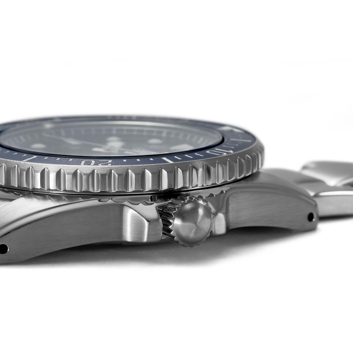 Rugged stainless steel diver watch case side with ridged bezel detail