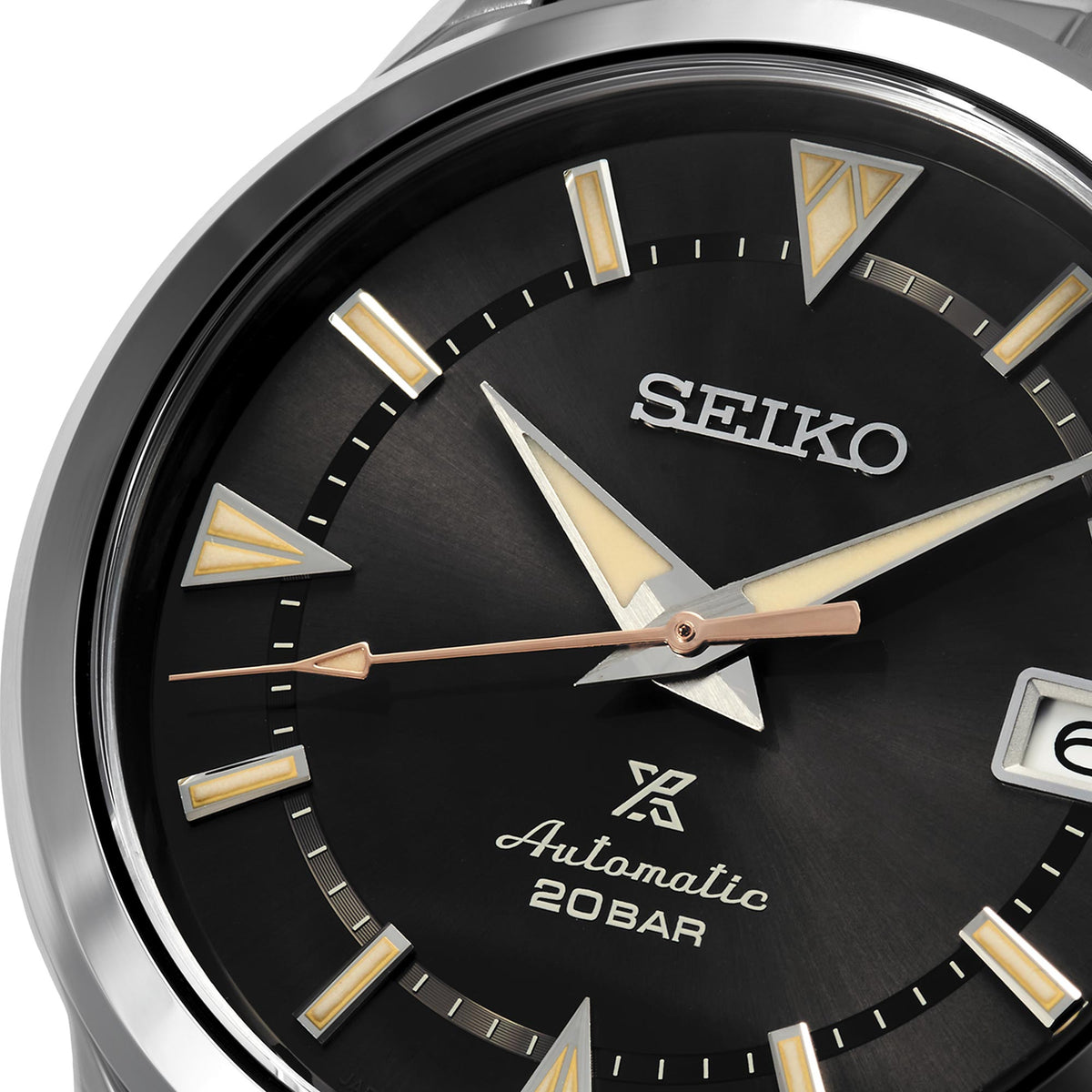 Seiko automatic black dial watch with gold markers, baton hands, and 20BAR text