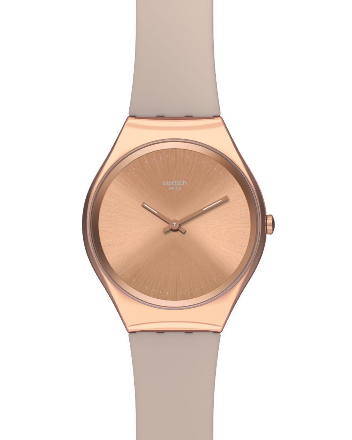 Centered view of pink-dial ladies silicone strap watch with rose-gold three-hand case