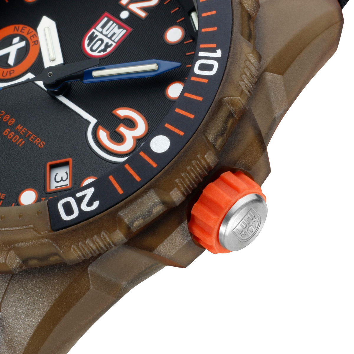 Men's dive watch dial close-up with LUMINOX markings, bezel numbers and orange markers