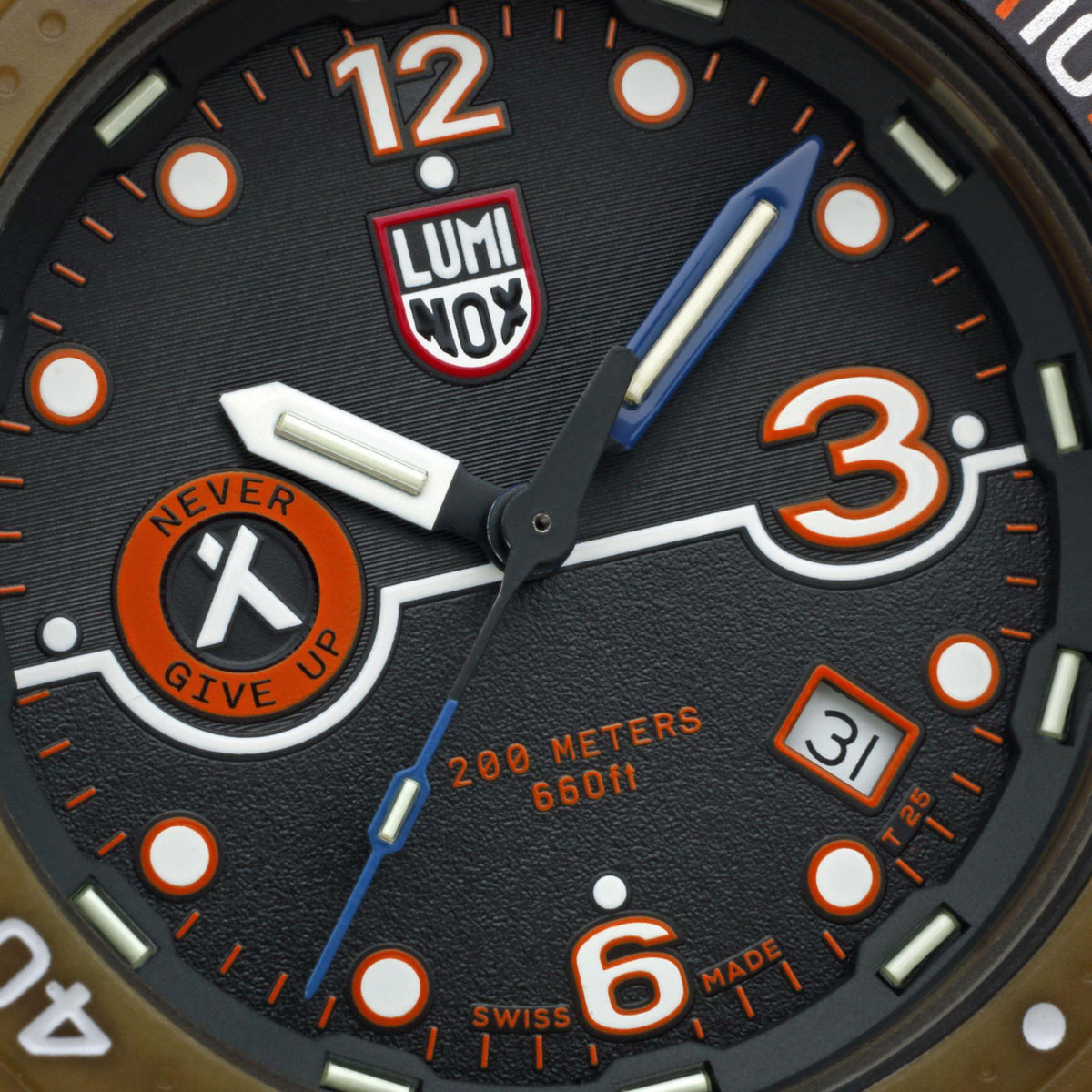 Men's black dial dive watch close-up with blue second hand, orange 3 and 12 markers