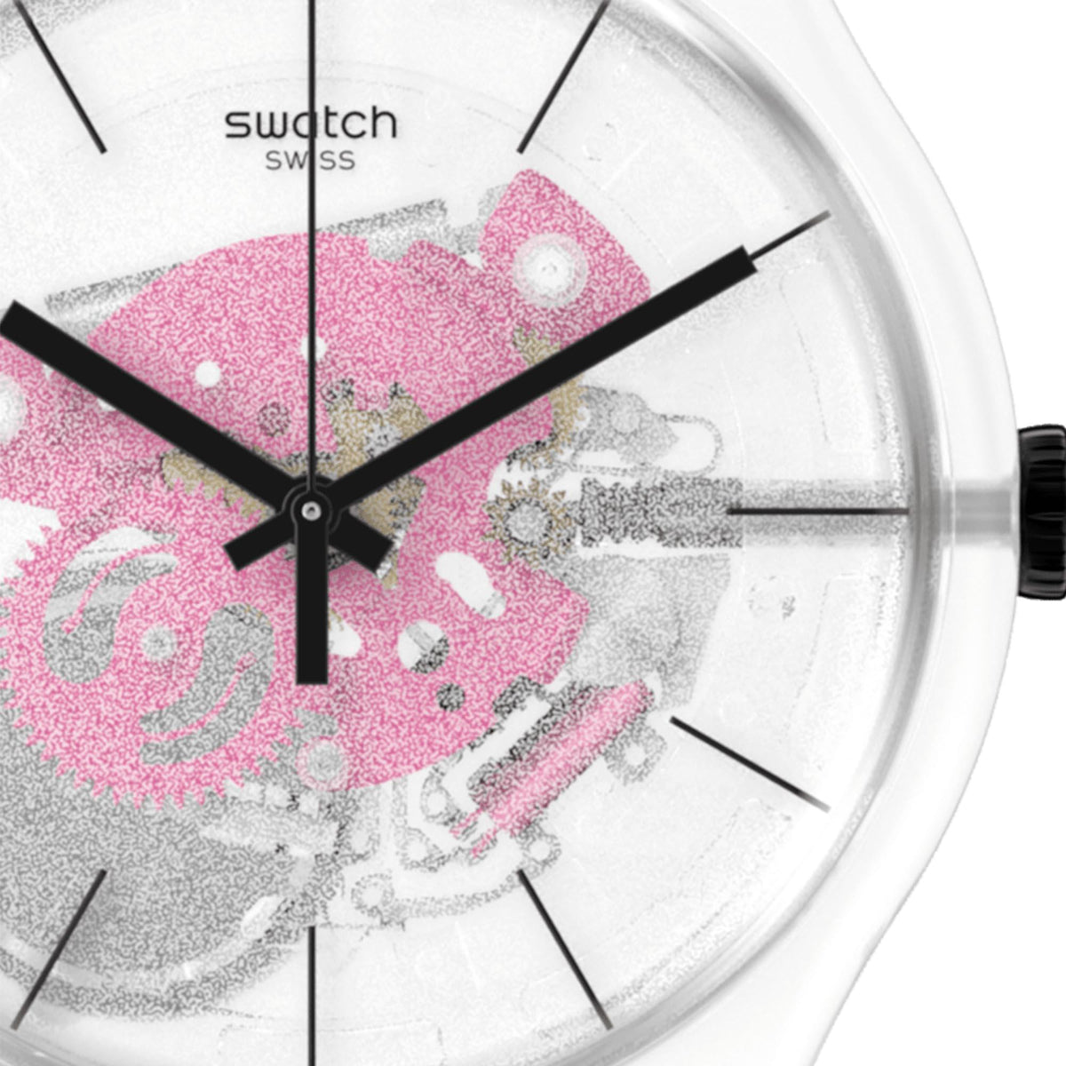Close-up view of pink dial with black hands, clear bezel, and crown on right