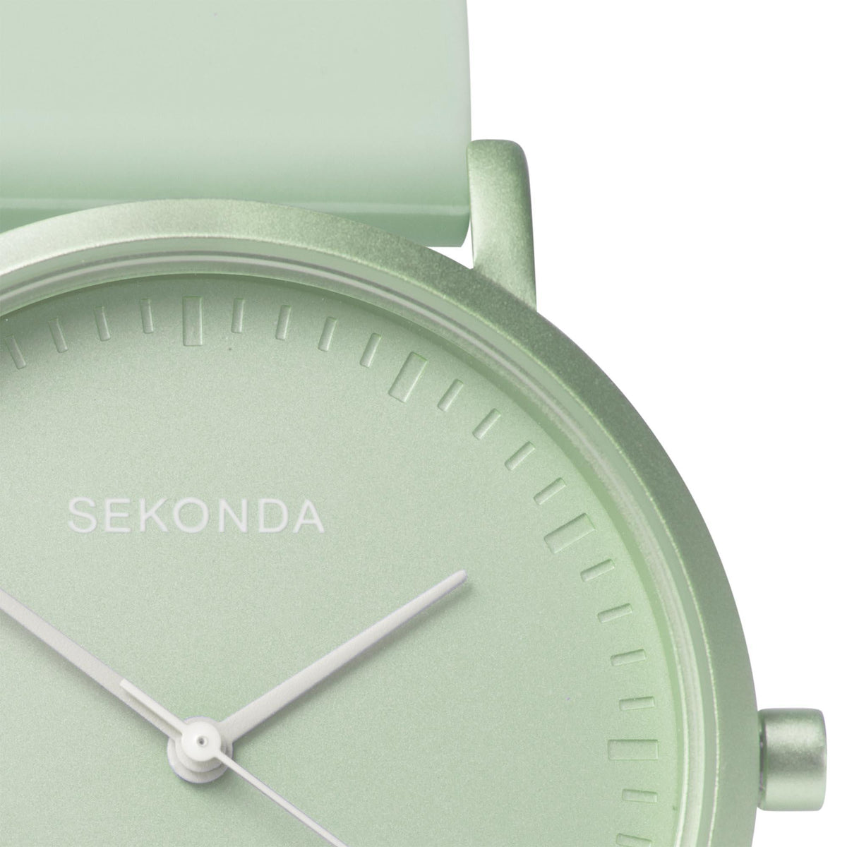 Light green quartz watch dial with baton markers and silver hands