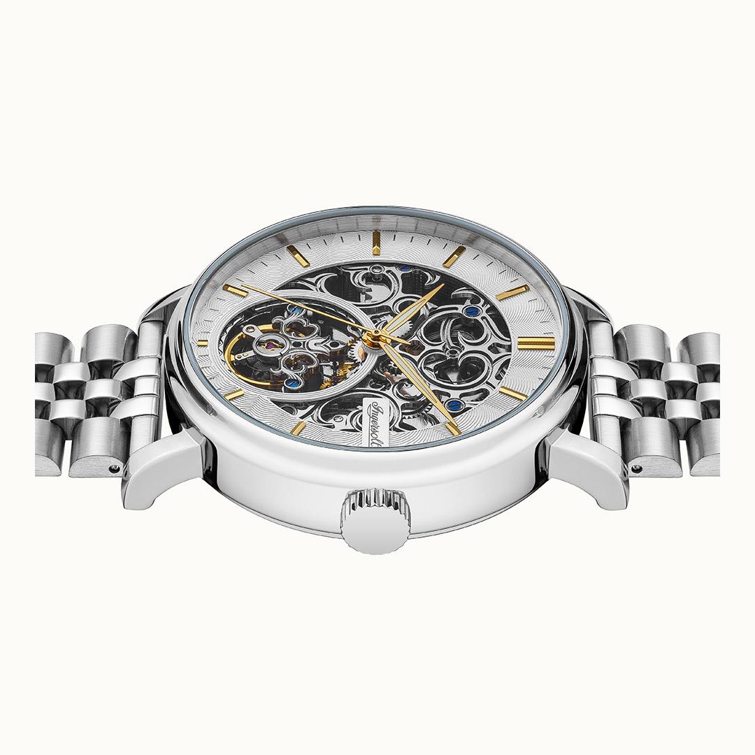 Men's automatic skeleton watch with silver dial, exposed gears, and stainless steel link bracelet