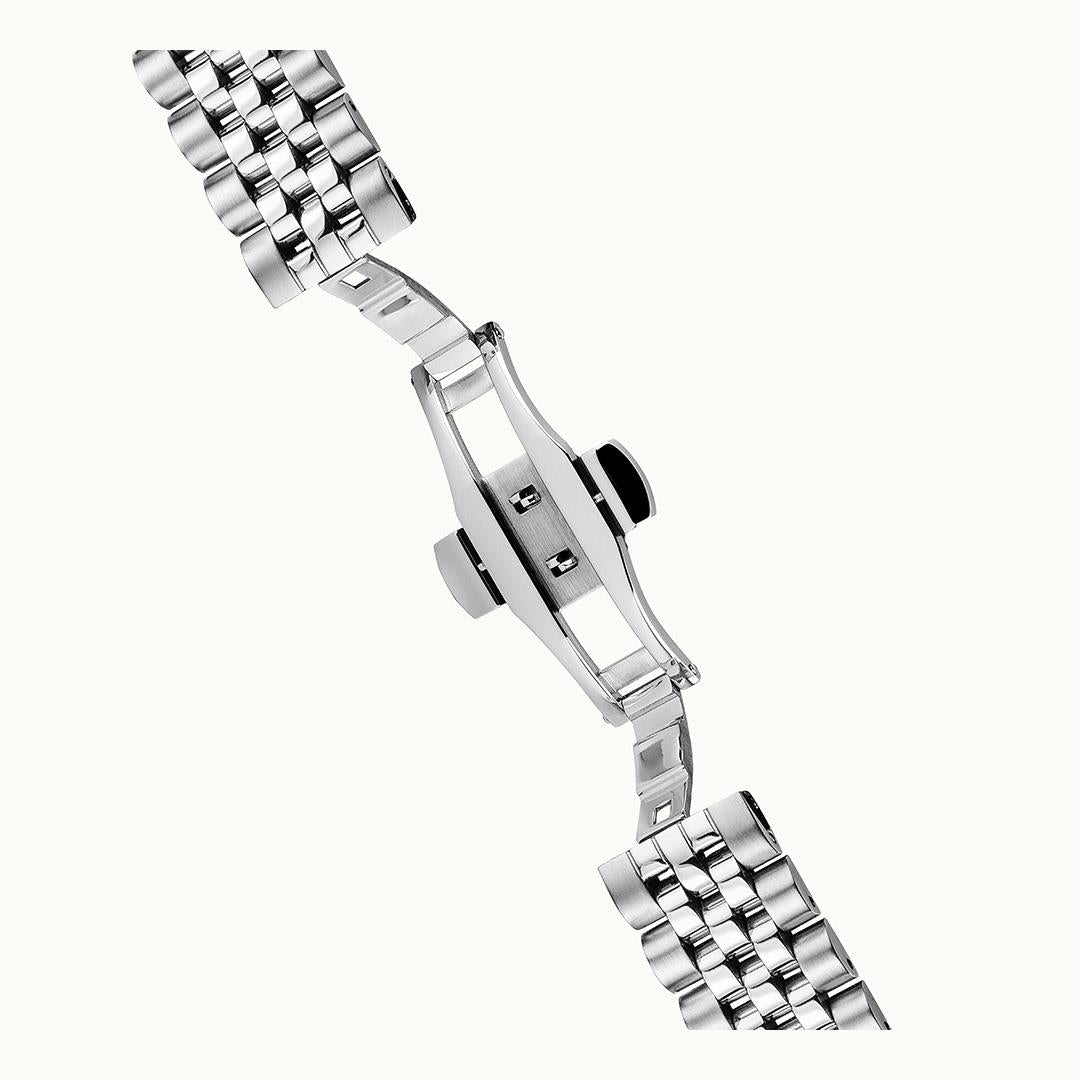 Stainless steel watch bracelet with deployment clasp and polished link segments
