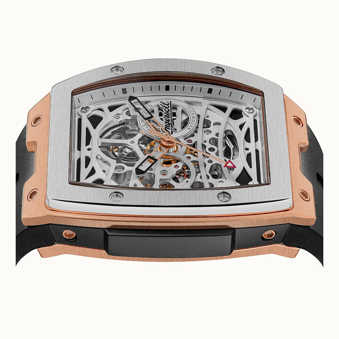 Men's automatic skeleton watch showing gears through open case, black strap and rose gold