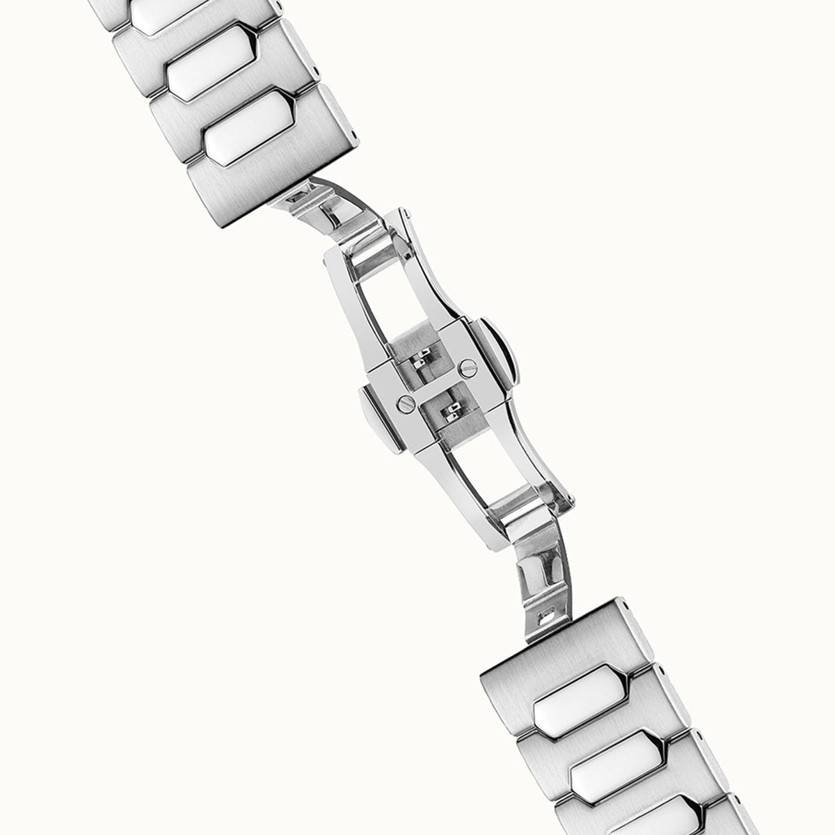 Stainless steel bracelet links with deployant clasp, close-up view for everyday wear.