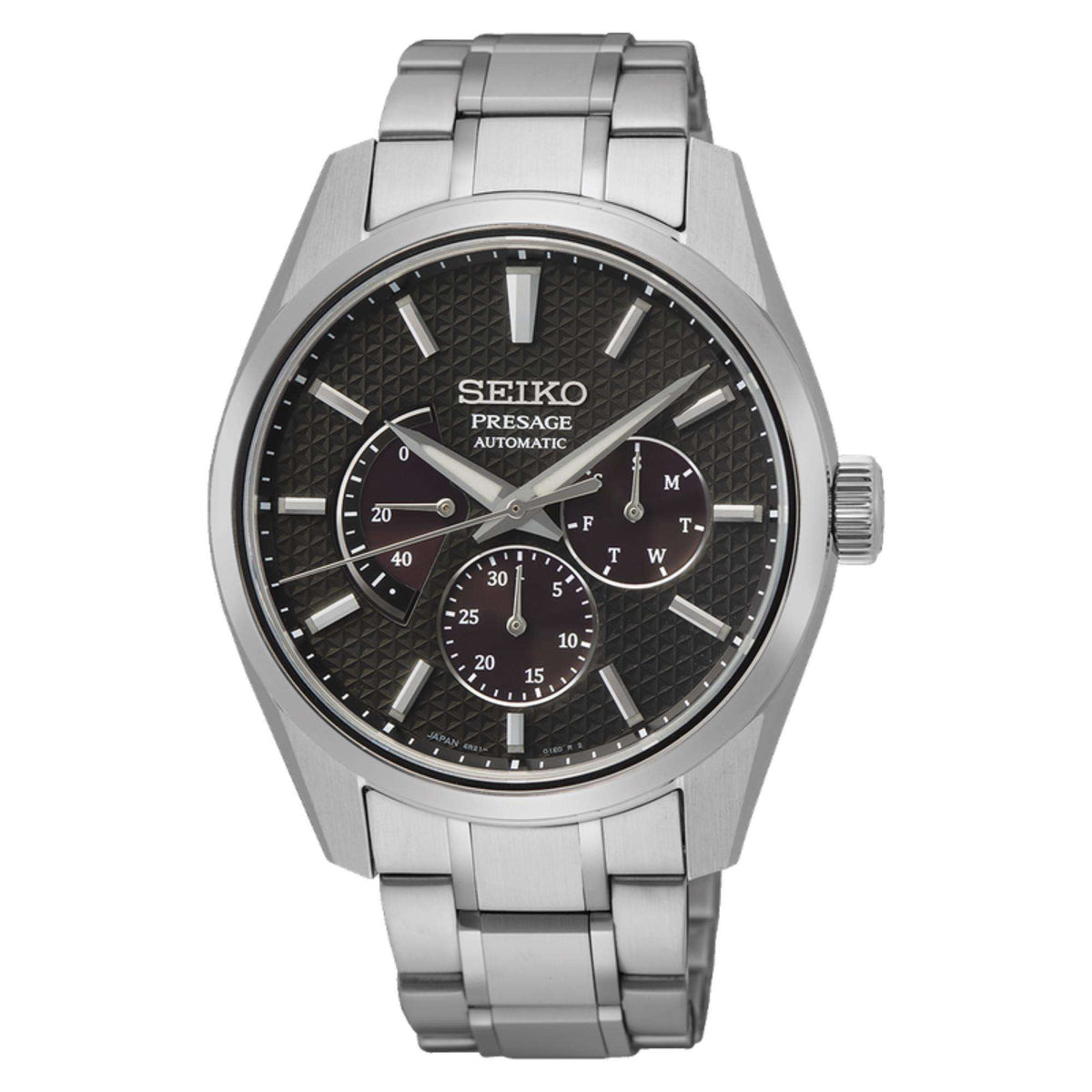 Round stainless steel men’s watch with black textured dial, subdials, and metal link band.