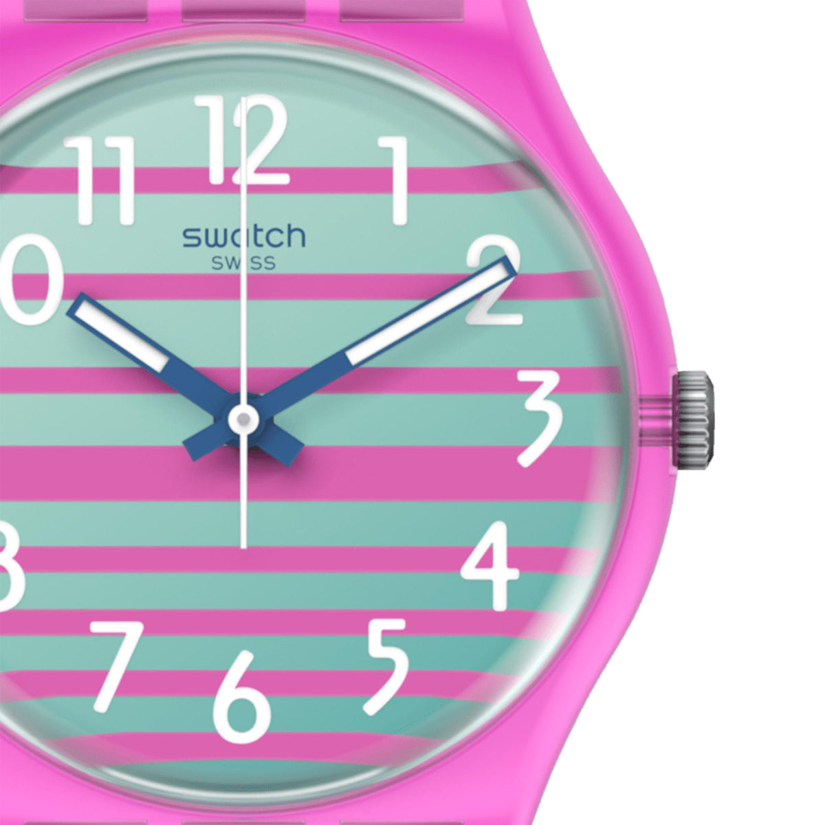 Close-up quartz watch dial with multicolor horizontal stripes, white numerals, and blue hands