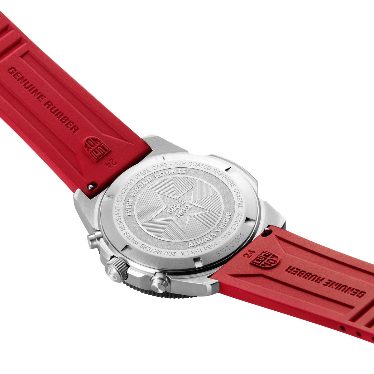 Diver chronograph watch caseback with engraved backplate and red rubber strap.