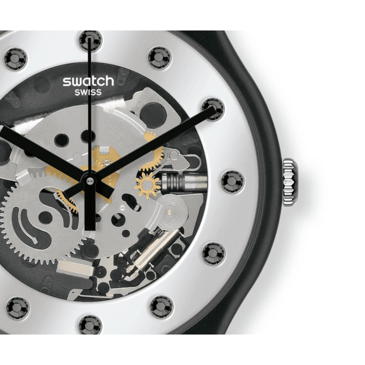 Close-up of silver skeleton dial with black hands, yellow accents, and metal gears