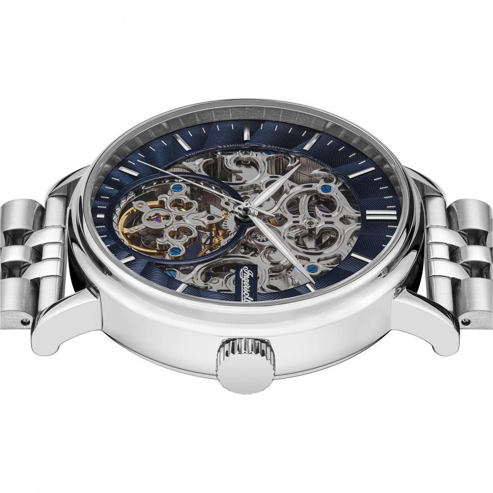 Automatic men’s watch with dark blue skeleton dial and silver stainless steel bracelet, side angle