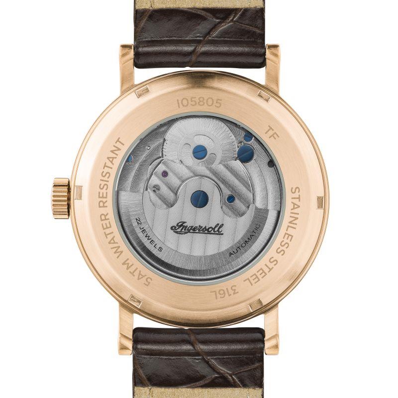 Watch case back with engraved rotor and brown leather strap