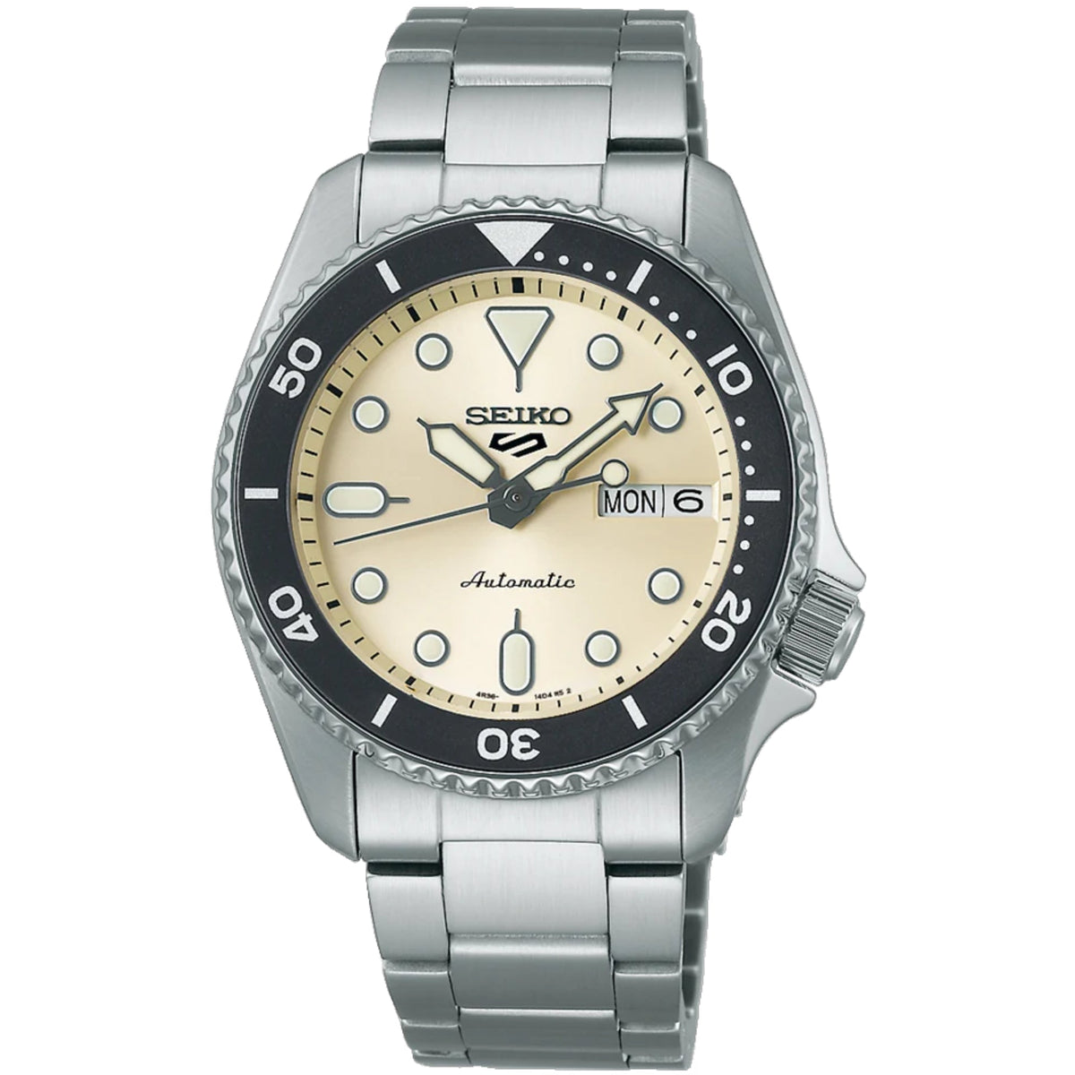 Seiko steel bracelet watch with cream dial, black bezel, lumed markers, and MON 6