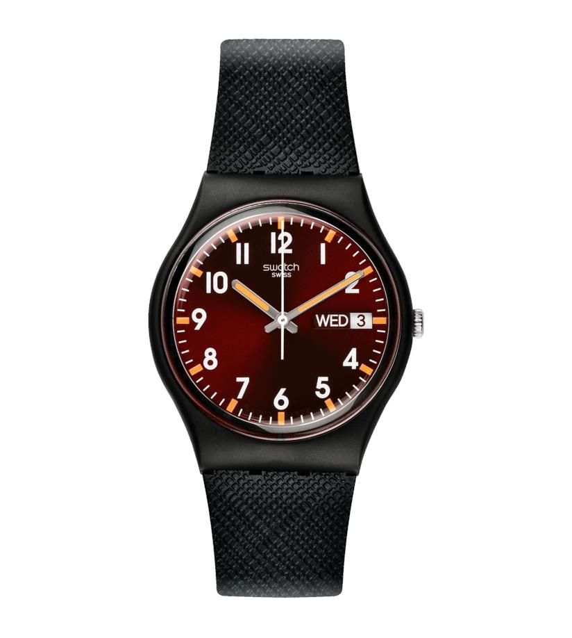 Red dial wristwatch with black textured strap, gold hands, and Wed 3 date display