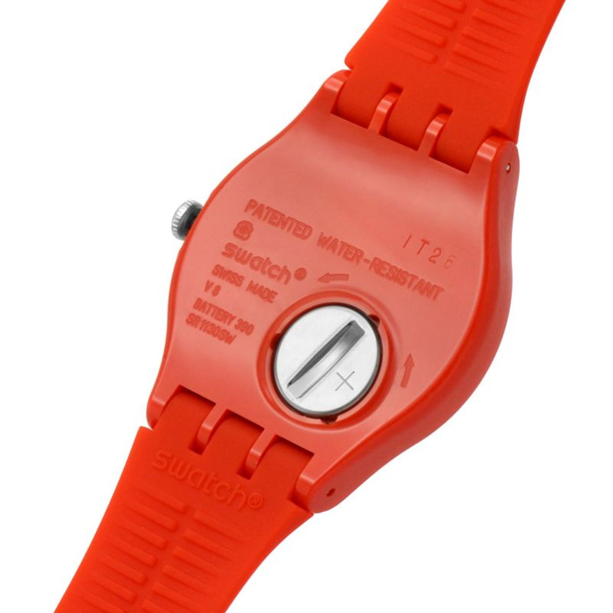 Red analog wristwatch with round dial and red silicone strap, close-up of case