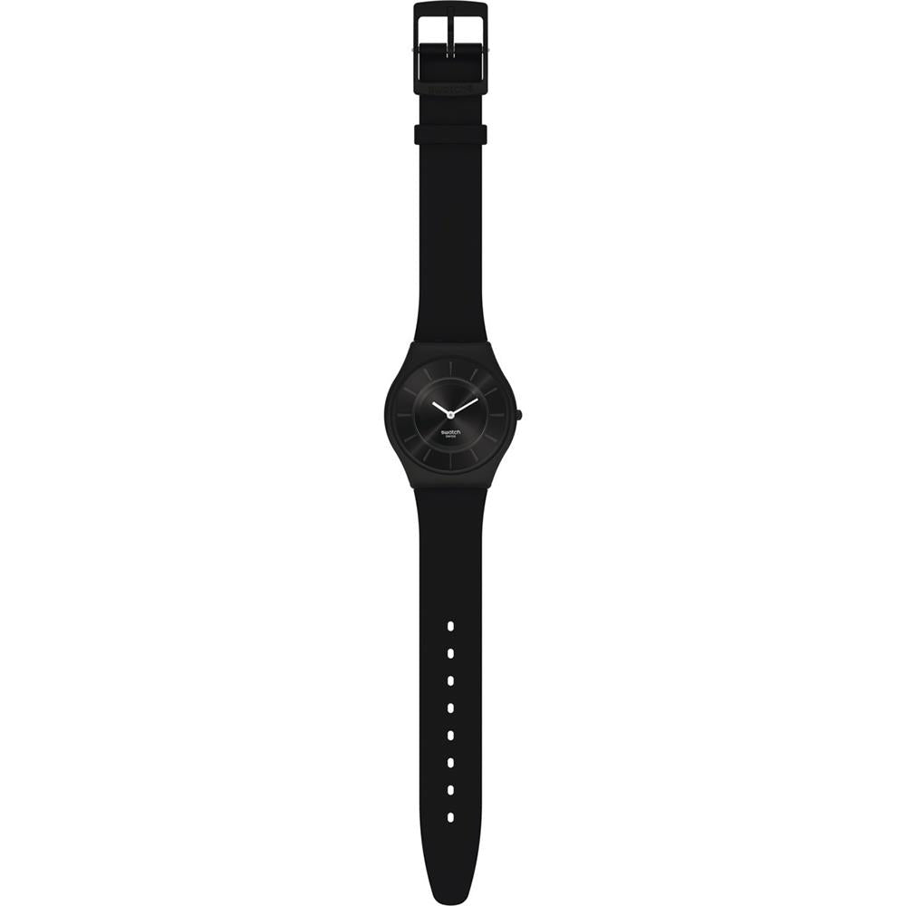 Men's black watch with rubber strap and buckle, angled profile view