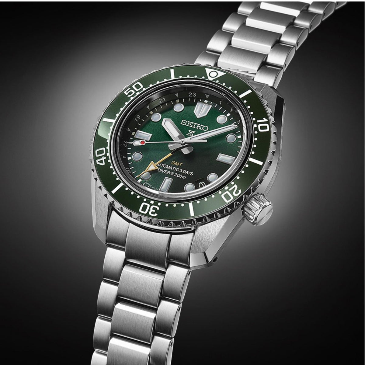 Seiko Prospex GMT diver wristwatch in side view with green dial and bezel markings