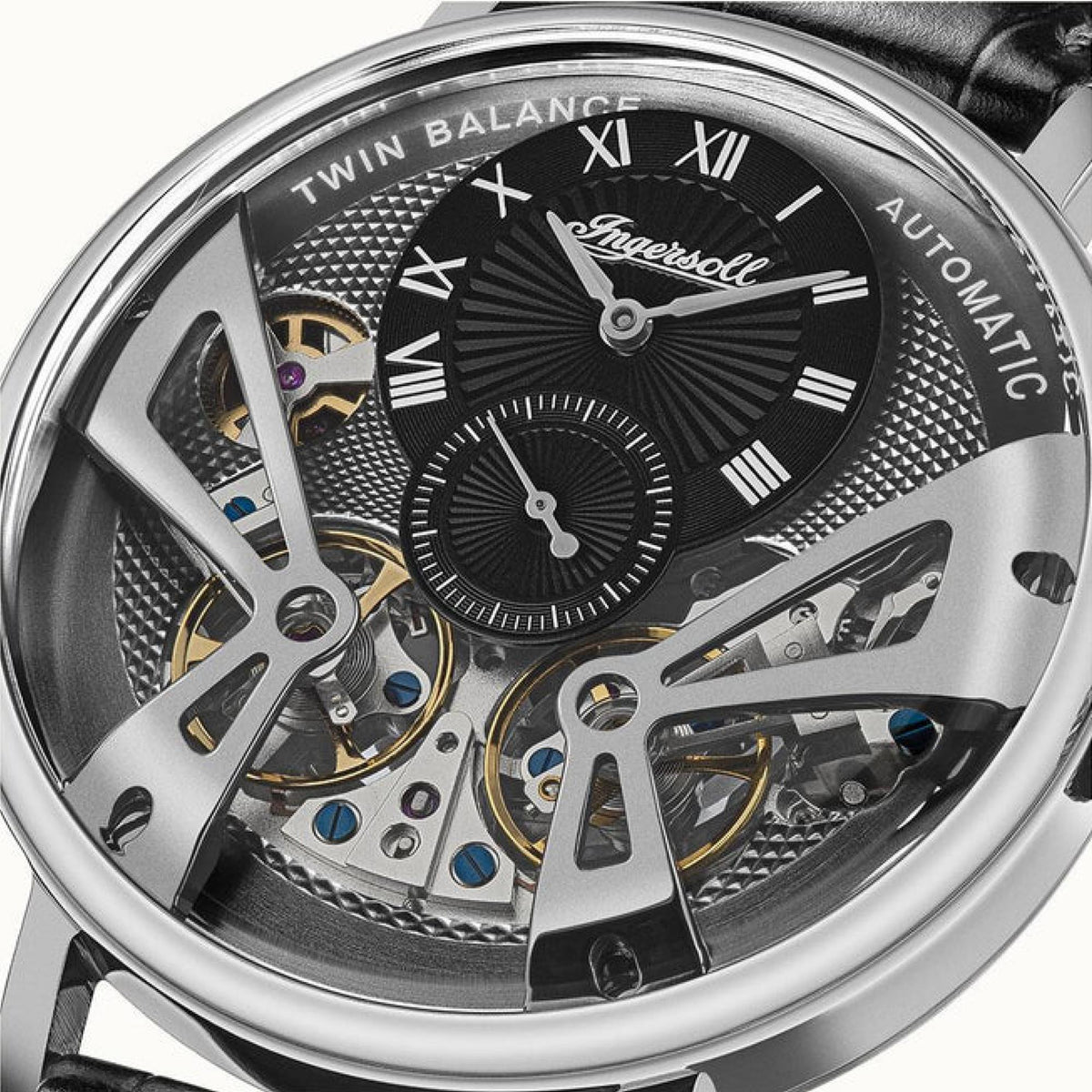 Close-up of Ingersoll automatic watch dial with roman numerals and exposed gears