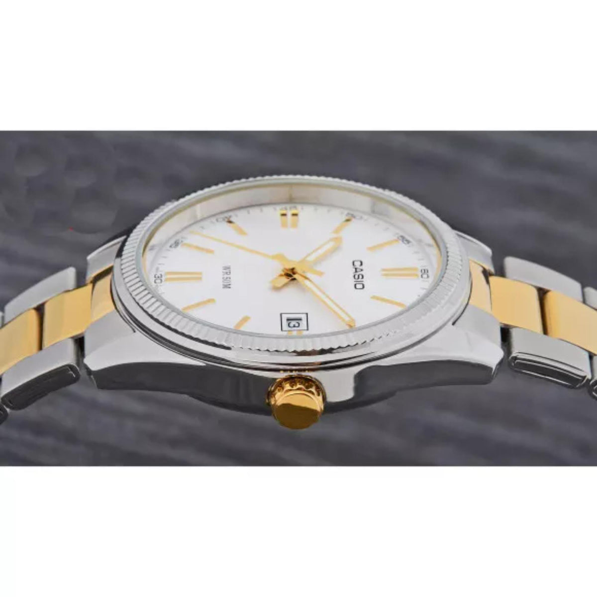 Side view highlighting the thin case profile and gold-tone crown of the Casio Timeless Collection MTP-1302PSG-7AVEF