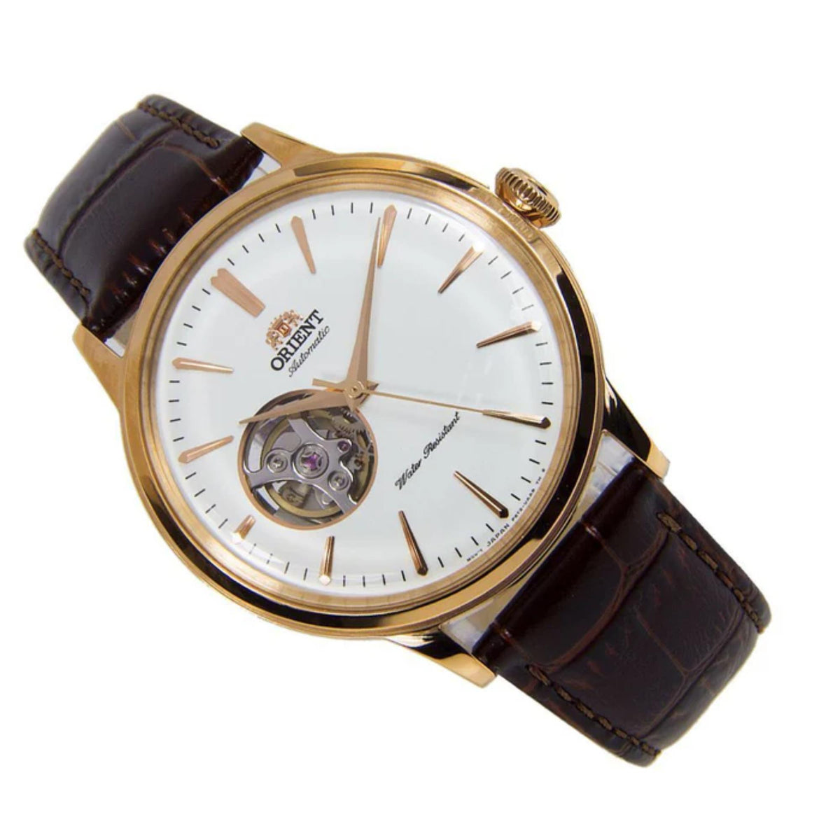 Gold-tone Orient watch with white dial, open-heart display, and brown leather strap angle view