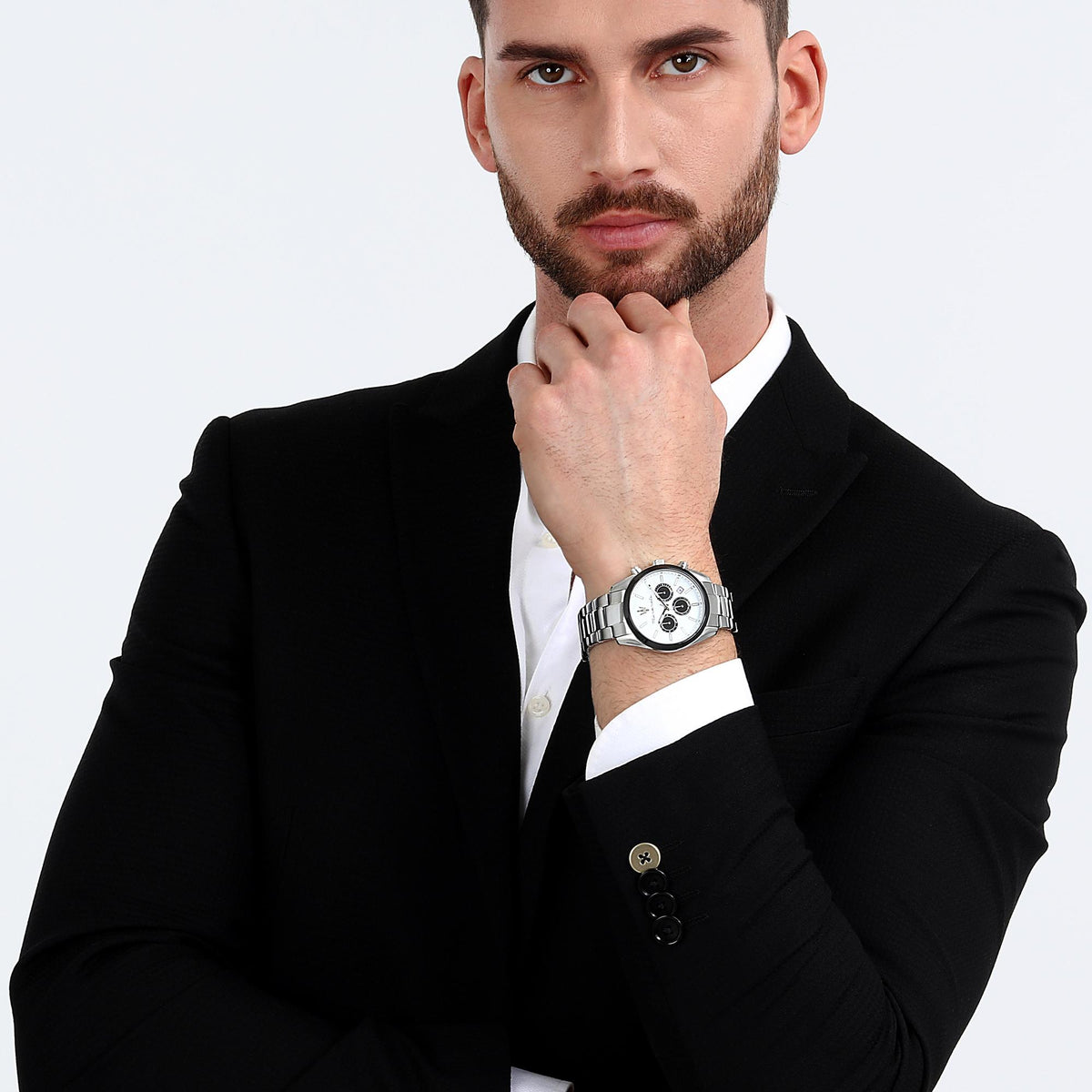 Men's round steel watch with white dial, black chronograph subdials, and metal bracelet