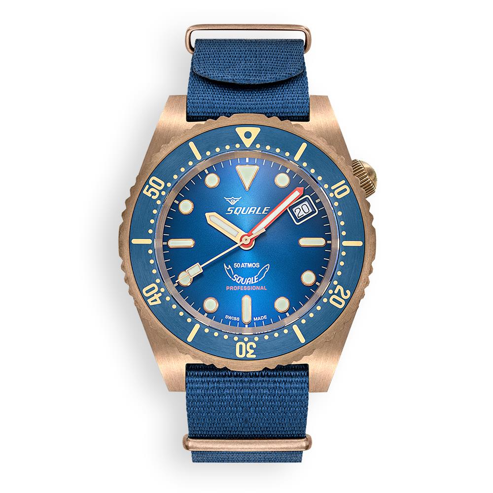 Men's bronze diver watch with blue dial and blue fabric strap, front view