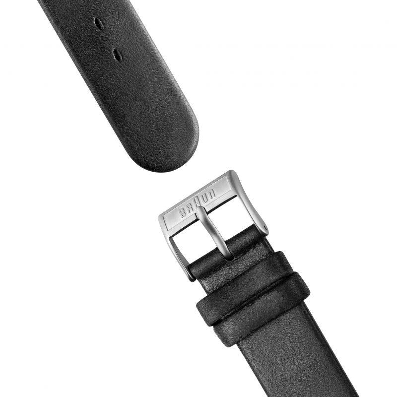 Black leather watch strap with stitched holes and metal buckle clasp