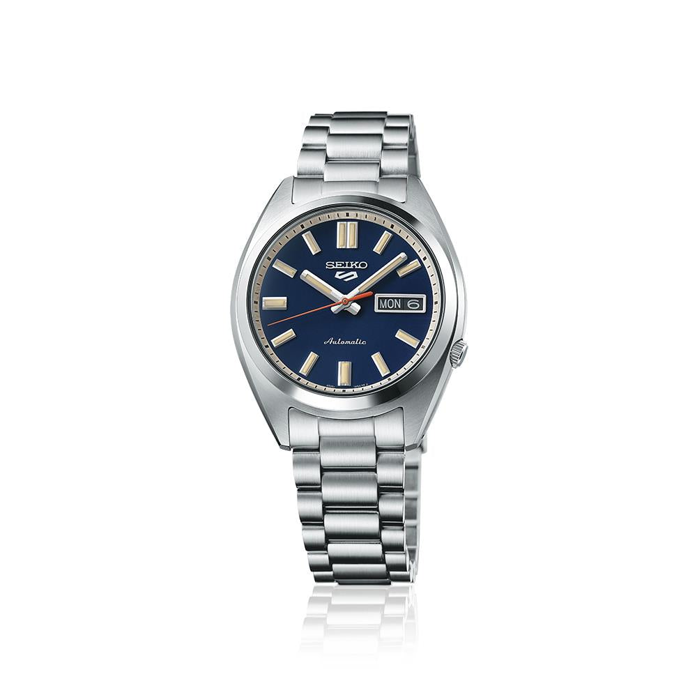 Seiko SRPK87K1 Blue Watch casting a slight reflection underneath on a stark white background.