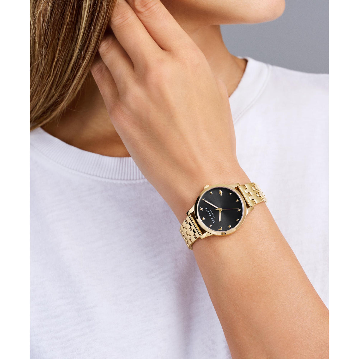 Ladies fashion watch with black dial and rose-gold tone metal link bracelet