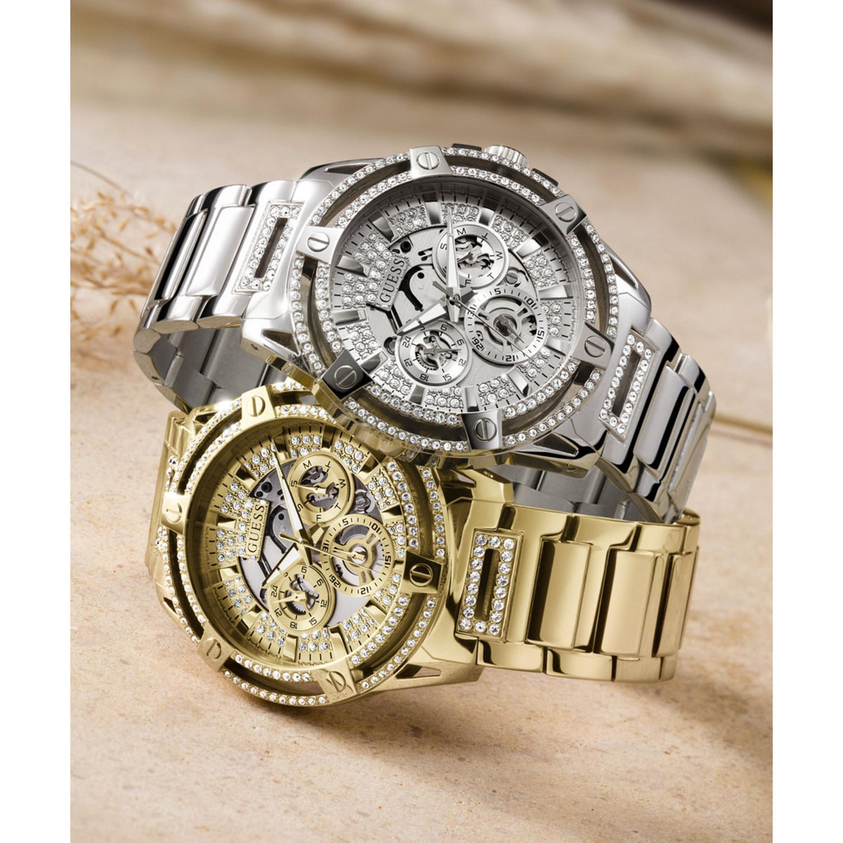 Two-tone men’s multifunction watch with silver dial, crystal bezel, and gold-tone bracelet