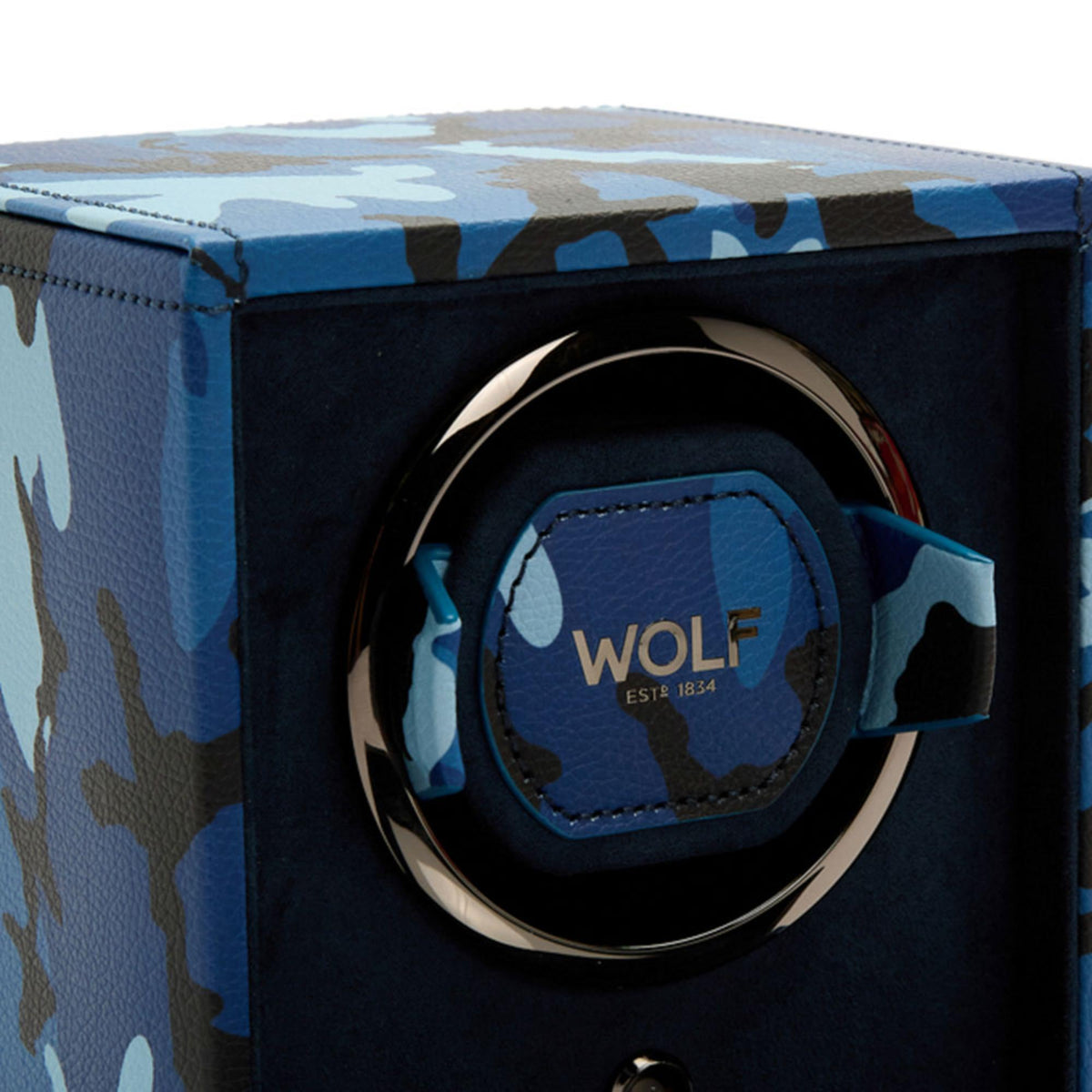 Wolf Elements single watch winder with blue camouflage cover and circular metal dial, logo.