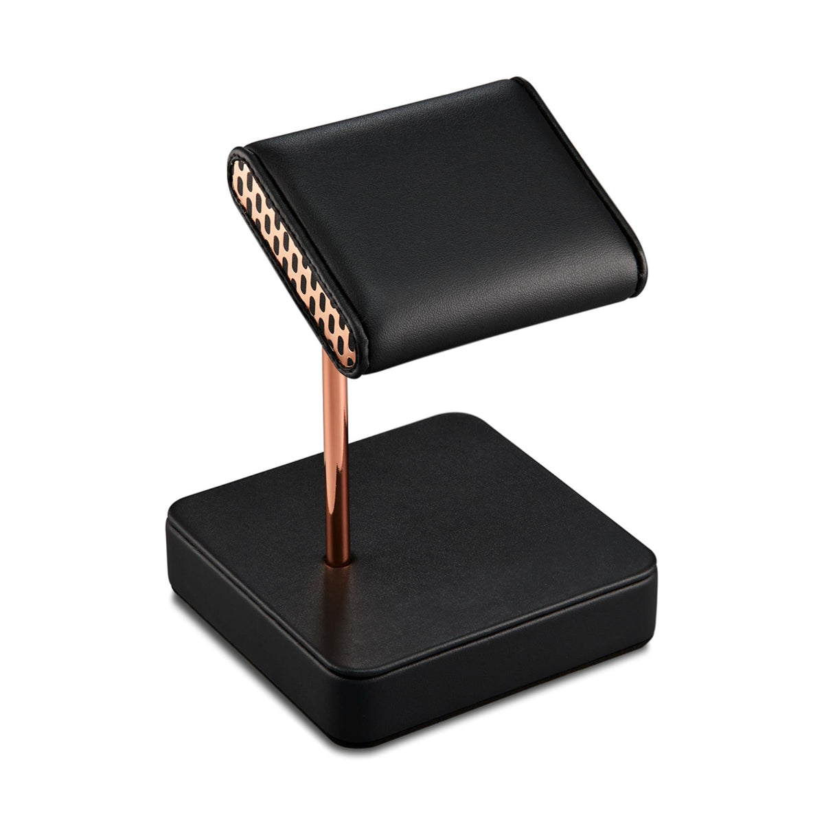 Single watch stand angled view: black padded top, black base, copper center post