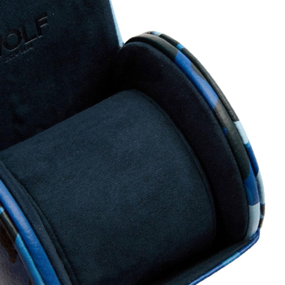 Single watch roll interior close-up with dark padding and blue camo outer edge