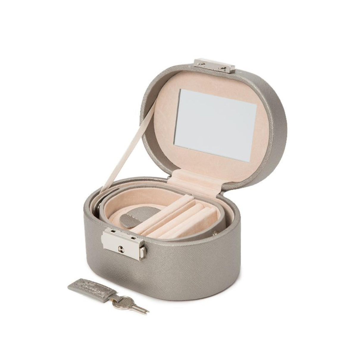 WOLF oval jewelry box opened with tan lining, compartments, and small keys outside
