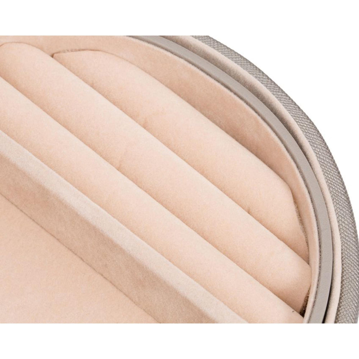 WOLF jewelry box interior close-up with tan padded ridged dividers
