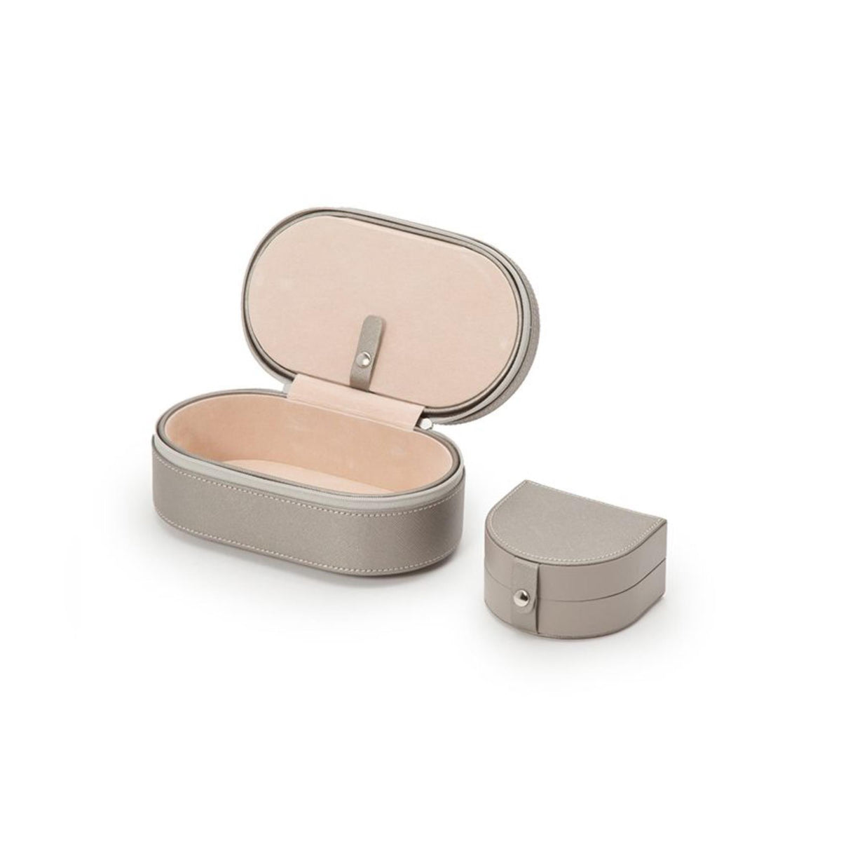 Oval zip leather case and small hinged case, both with tan leather exteriors