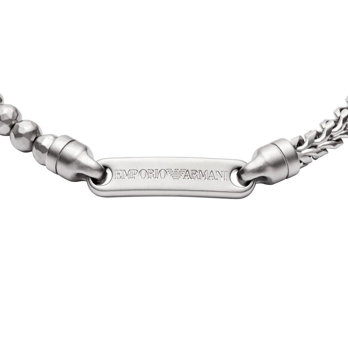 Stainless steel ID bracelet close-up showing engraved center bar and bead connectors