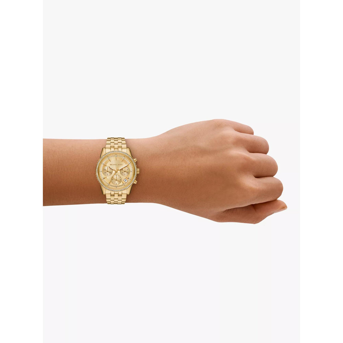 Gold-tone chronograph watch on hand with gold dial and shiny metal link band