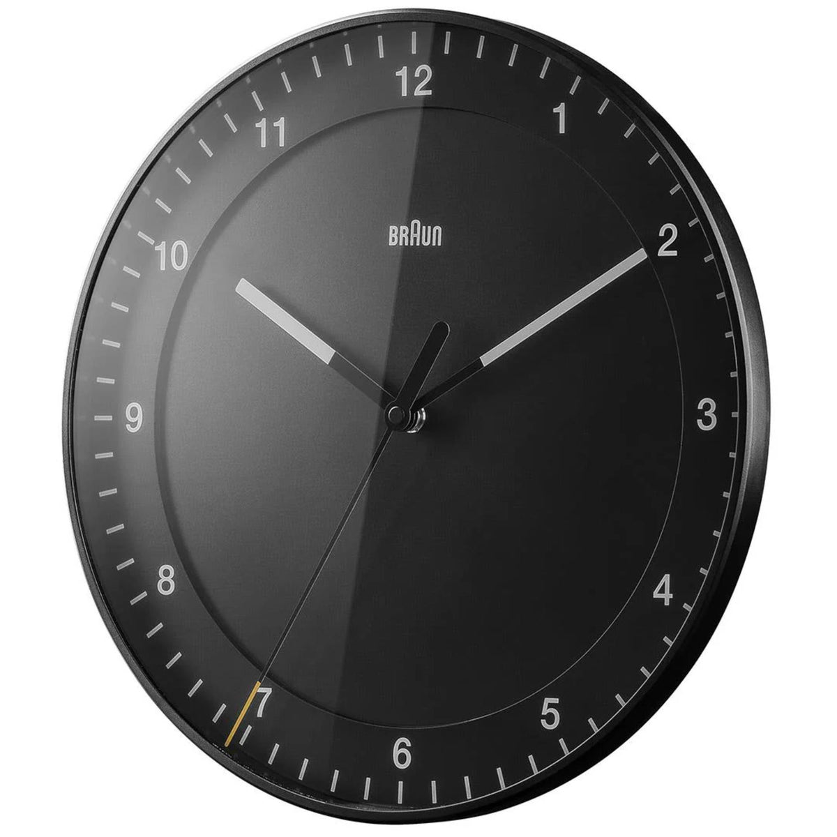 Braun wall clock with dark black face, white markers, and central hands