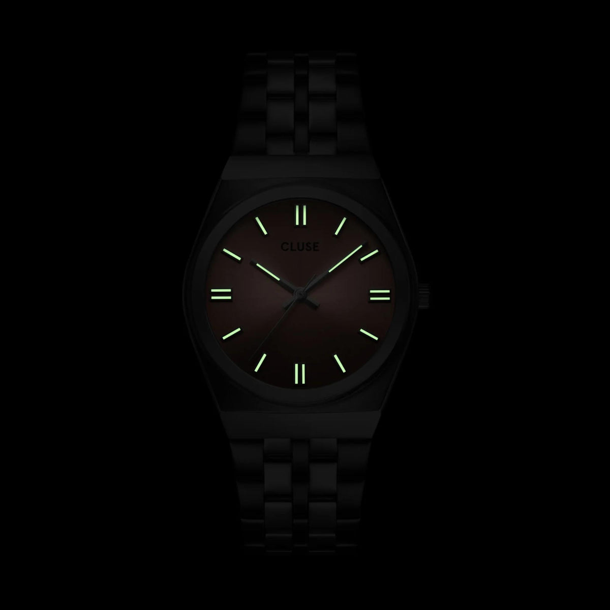Black steel wristwatch with dark dial and green luminous hour markers