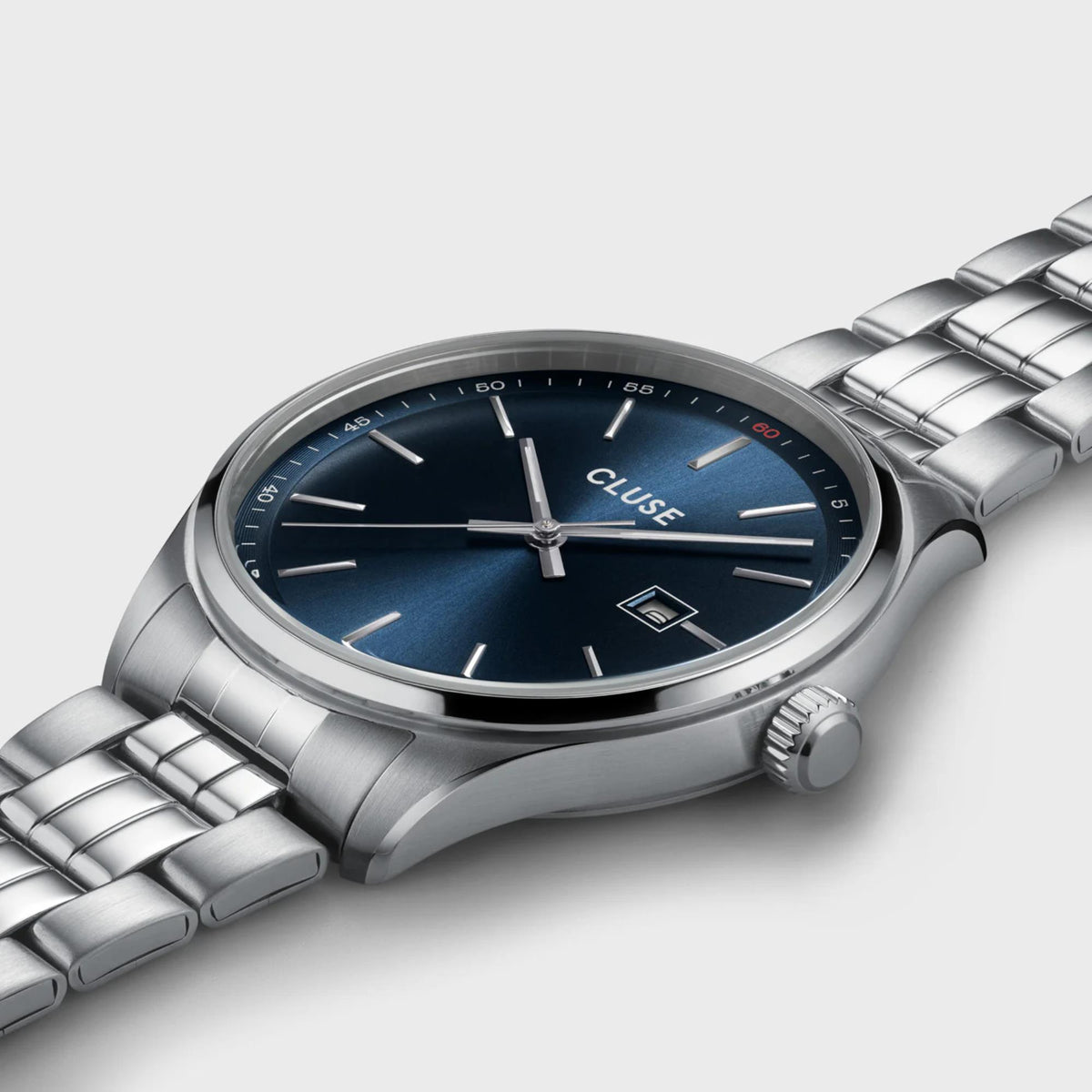 Men's steel wristwatch with blue dial and knurled crown, bracelet links