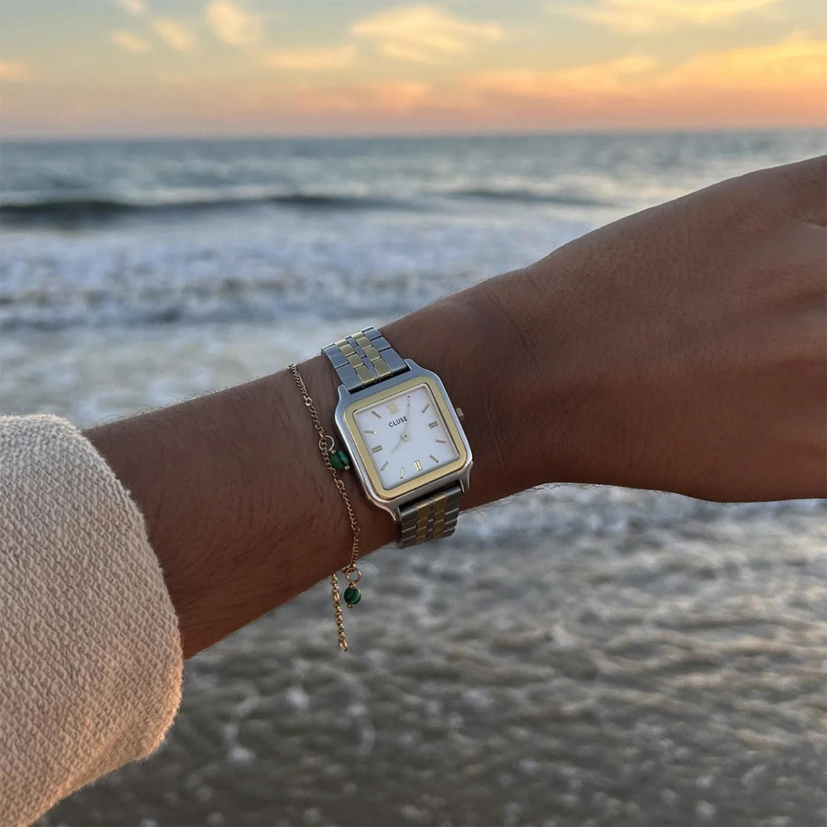Women's rectangular quartz watch with white dial and silver metal link strap